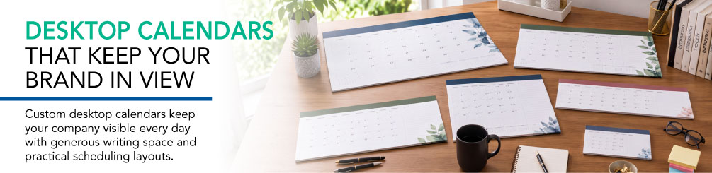 Desk pad calendars that keep your brand in view, displayed on an office desk