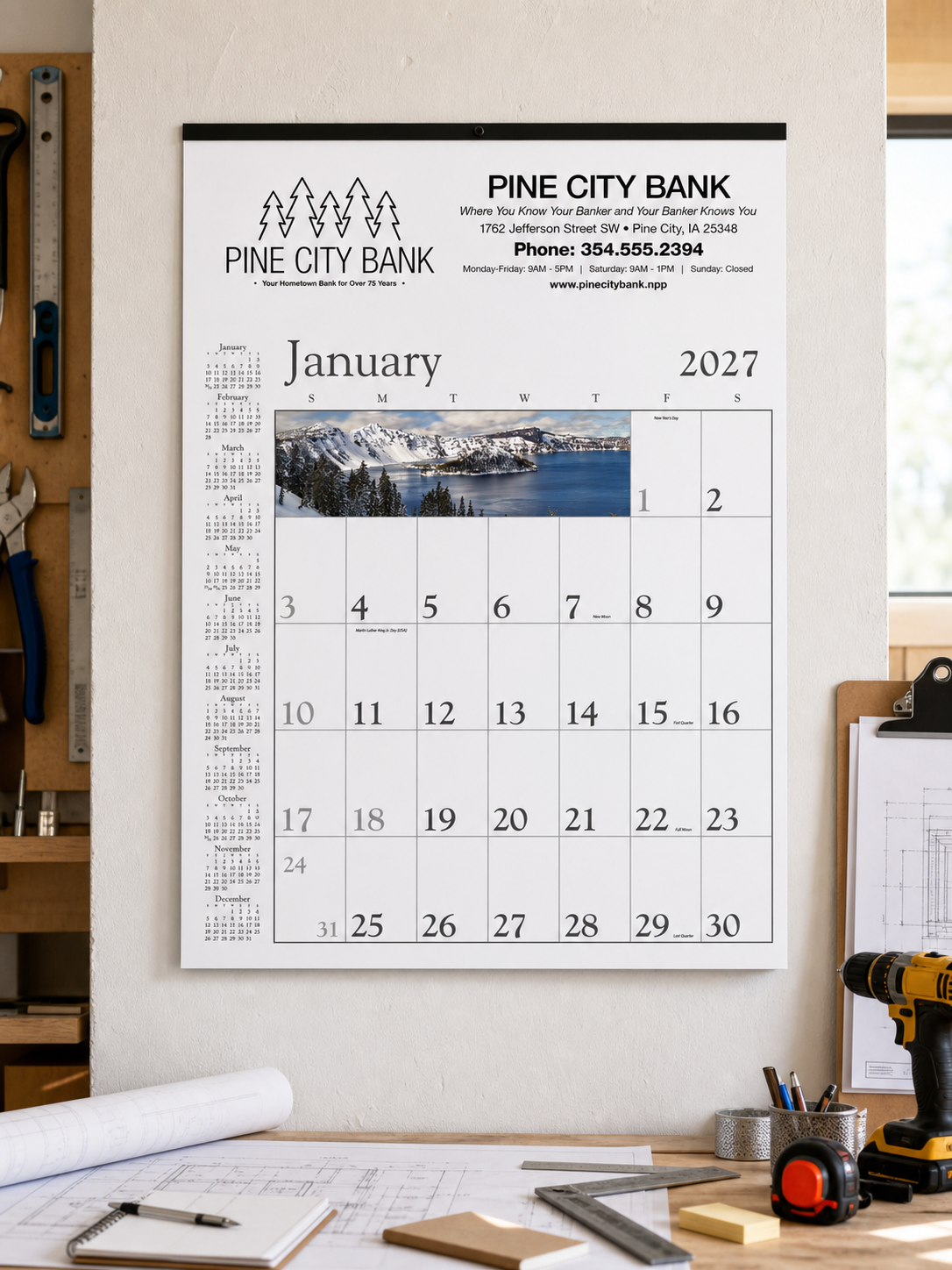 White and Black Contractor Memo Calendar displayed in a professional workspace