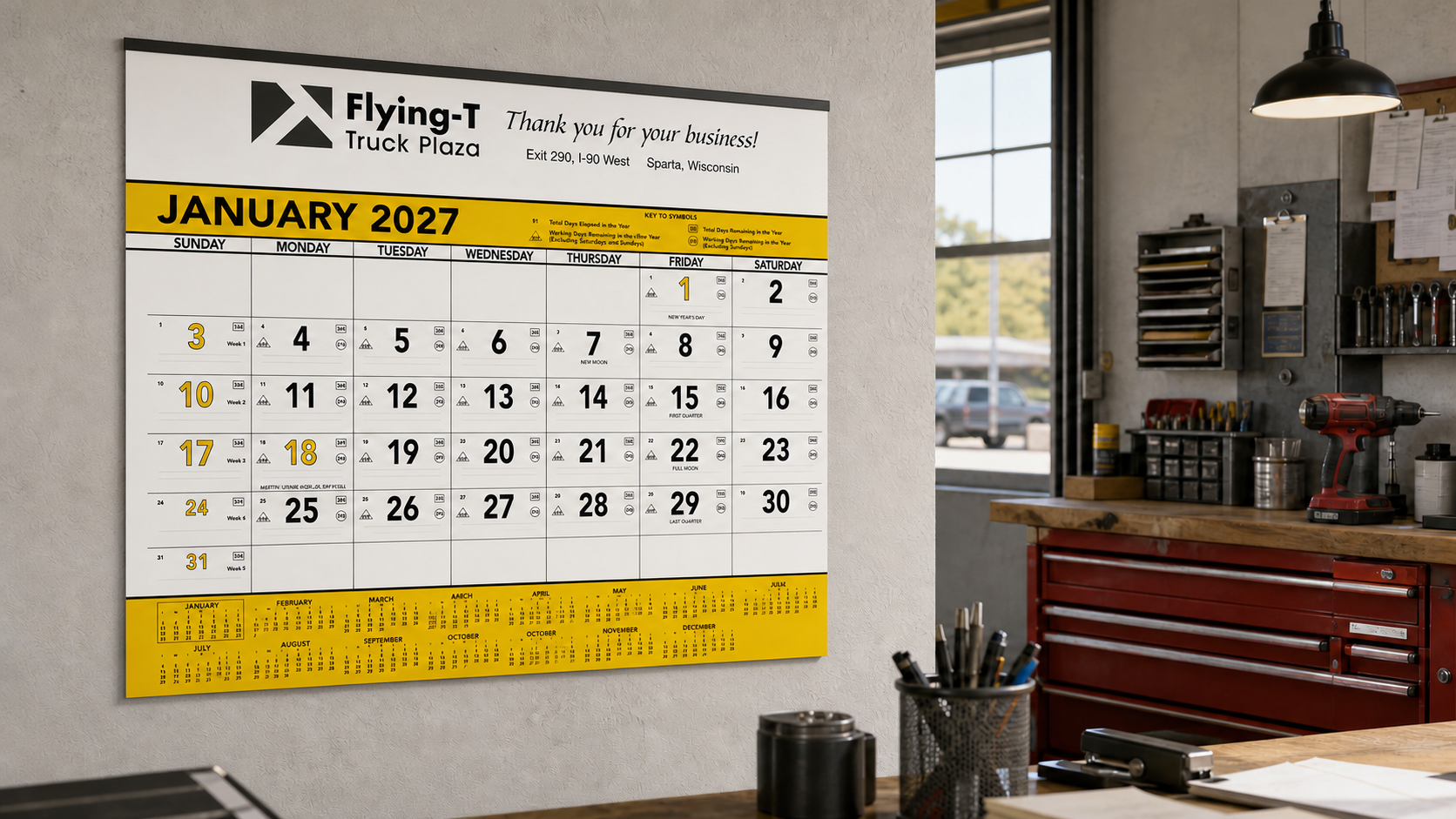 Yellow and Black Contractor Memo Calendar displayed in a professional workspace